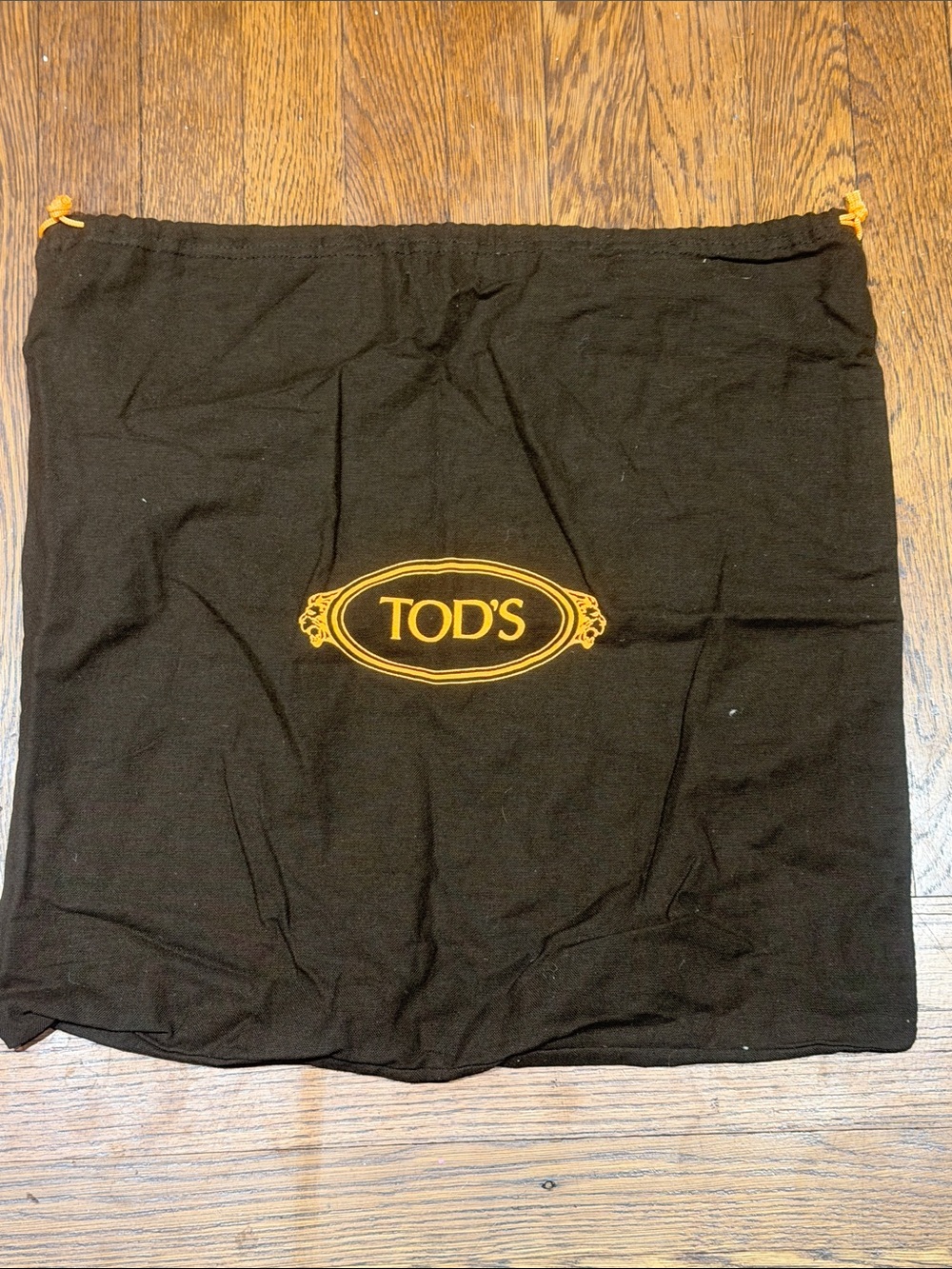Tod's Black Dust Bag with Gold Logo